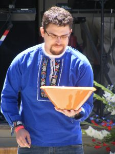Man Holding Bowl at Swiss National Day